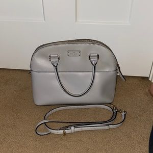 Grey Kate spade hand bag with cross body strap